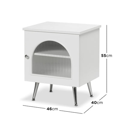 Matteau 46cm Bedside Table with Glass Door in White, featuring a ribbed glass panel door, chrome-plated legs, and a fixed interior shelf for stylish bedroom storage.