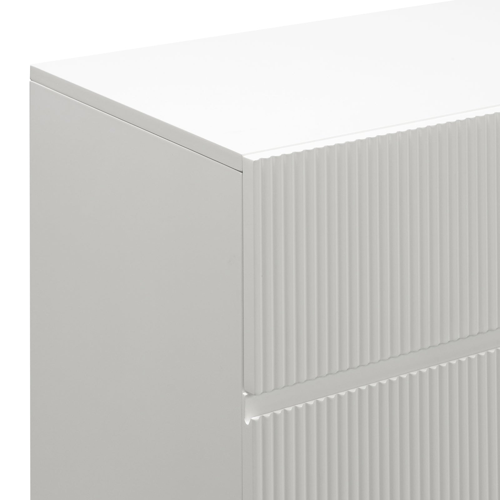 Nasrin 120cm Lowboy Dresser with Drawers in White, featuring a smooth top and sides with vertically fluted drawer fronts, offering a modern textured look and ample storage.