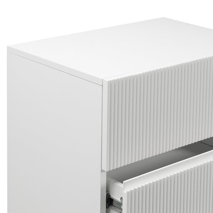 Nasrin 60cm Tallboy Dresser with Drawers in White, features a matte-white finish with fluted drawer fronts, showcasing two metal slide drawers, one partially open, highlighting its sleek, modern design.