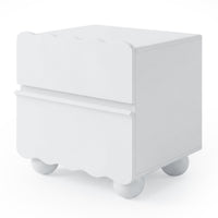 White modern nightstand with wavy drawer fronts on white background