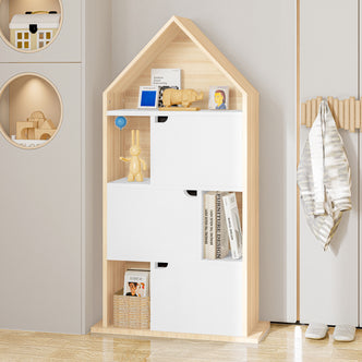 Quinta Bookshelf with Cabinet White & Natural: A house-shaped, light wood shelving unit with three white sliding-door compartments, featuring a wooden rhinoceros, rabbit figurine, books, and a woven basket.