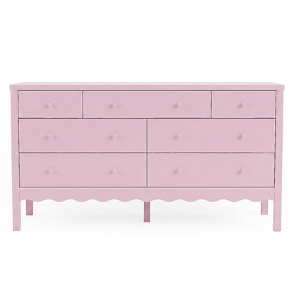 Pink dresser with eight drawers on white background