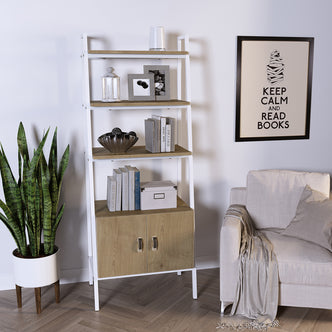 Shawn 183cm 4-Tier Display Bookshelf in Natural & White, featuring a white frame with wood shelves, leans against the wall, holding books, decor items, and a bottom cabinet with wood-grain doors.