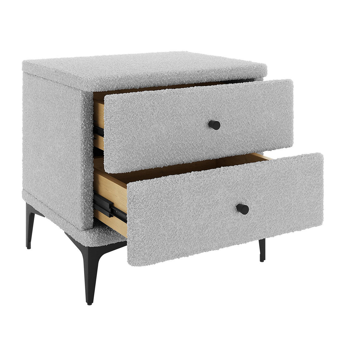 Shona Upholstered Boucle Bedside Table in Grey, featuring two textured fabric drawers, wood interiors, and slender black metal legs, offering a sophisticated and practical addition to any bedroom.