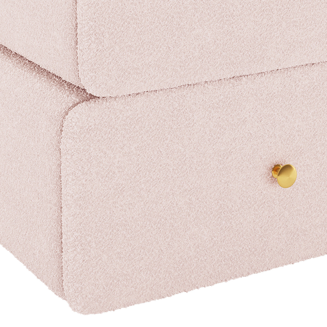 Close-up of the Tyla Boucle Upholstered Bedside Table in Light Pink, featuring a plush bouclé fabric, rounded drawer edges, and a gold knob on the lower drawer, showcasing modern elegance.