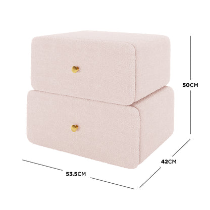 Tyla Boucle Upholstered Bedside Table in Light Pink, box-shaped with two drawers, brass knobs, and pale pink bouclé fabric, measuring 53.5cm wide, 42cm deep, and 50cm tall.