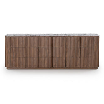 Full sideboard with fluted wood front and marble top on a white background