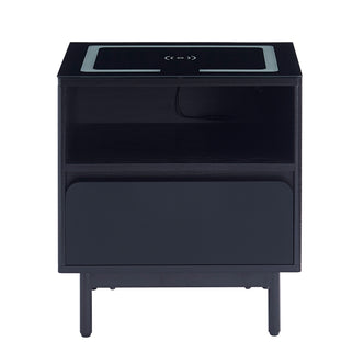 Zayn Smart Bedside with Wireless Charger in Black, featuring a built-in charging pad, open shelf, rounded-front drawer, and short tapered legs, showcasing a modern, compact design for enhanced functionality.