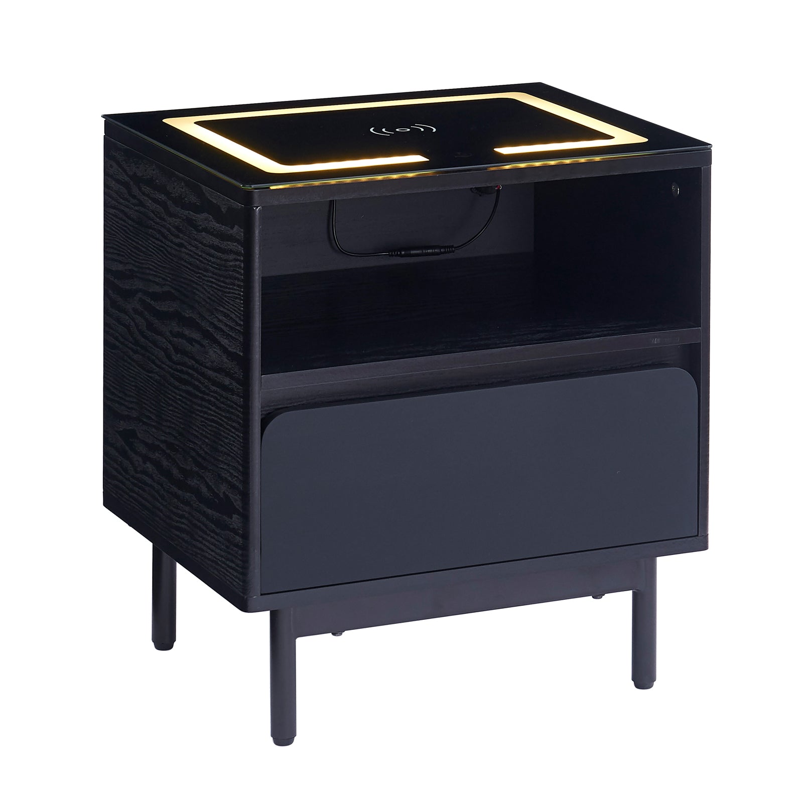 Zayn Smart Bedside with Wireless Charger in Black, featuring a sleek design with an open cubby, single drawer, and a glass top with an LED-lit Qi charging pad.