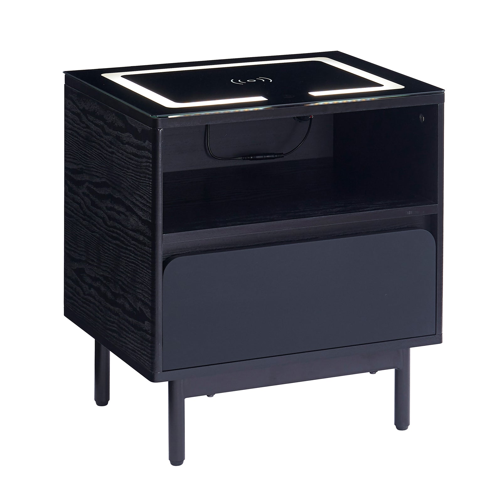 Zayn Smart Bedside Table with Wireless Charger in Black, featuring a sleek design with an open cubby, single drawer, built-in wireless charging pad, and LED-lit top surface on slender legs.