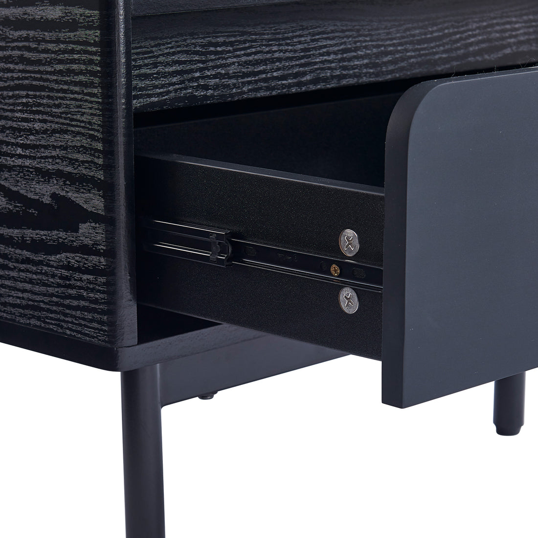 Zayn Smart Bedside Table with Wireless Charger in Black, showcasing a close-up of its sleek design, black wooden finish, visible metal drawer-slide mechanism, and slender legs, emphasizing modern elegance and functionality.