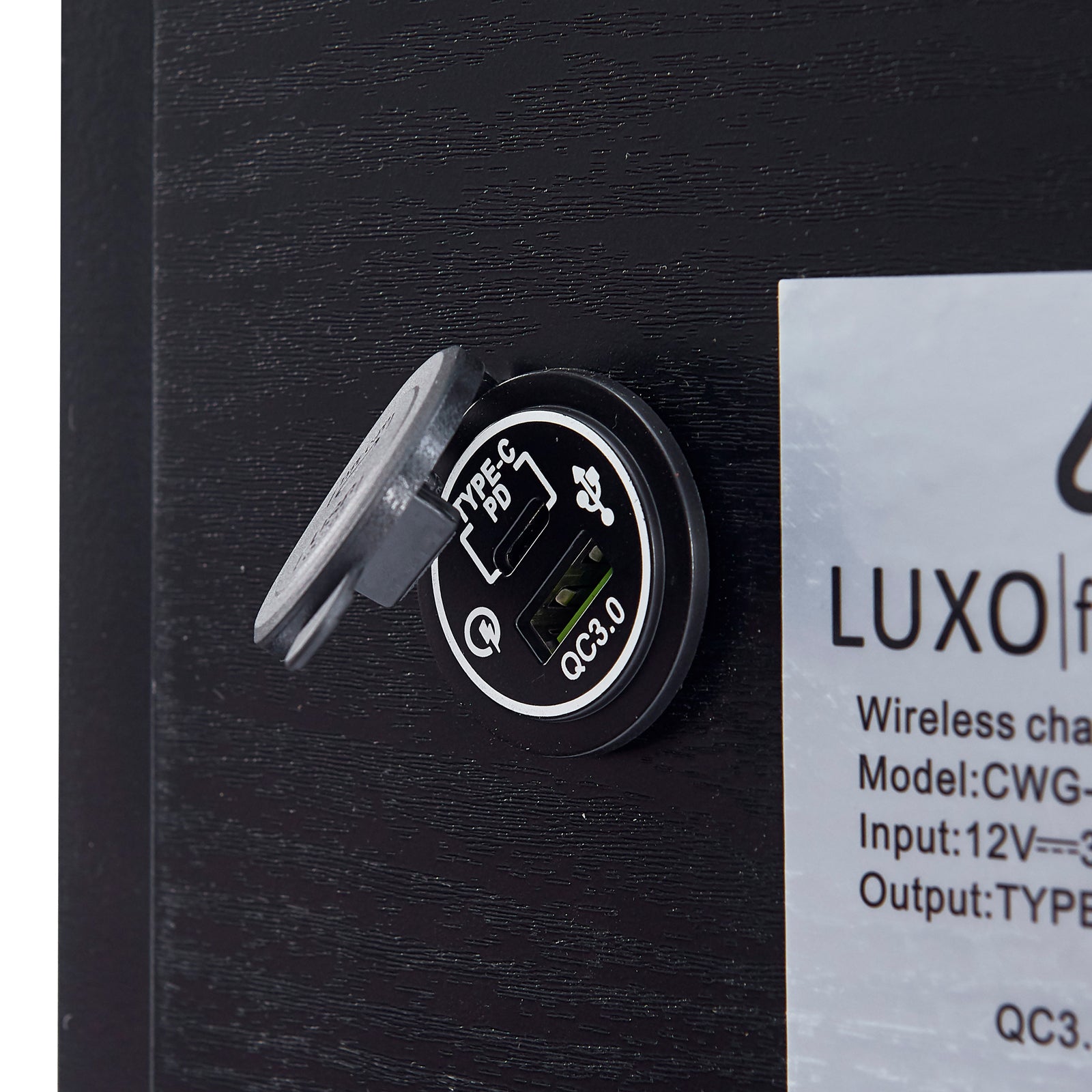 Zayn Smart Bedside with Wireless Charger in Black, featuring a built-in USB charging module with open flip-up cover, revealing USB-C and USB-A ports for efficient device charging.