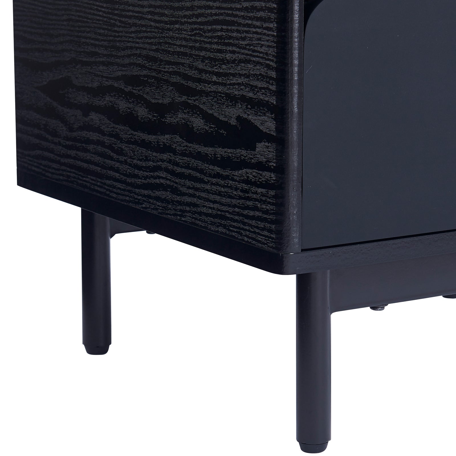 Close-up of the Zayn Smart Bedside Table with Wireless Charger in Black, showcasing its black wood-grain cabinet on slim metal legs, emphasizing modern design and functionality.