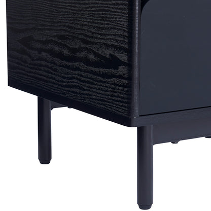 Close-up of the Zayn Smart Bedside Table with Wireless Charger in Black, showcasing its black wood-grain cabinet on slim metal legs, emphasizing modern design and functionality.