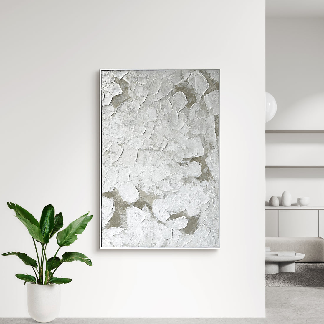 Luma Framed Textured Abstract Canvas displayed in a contemporary living space, demonstrating how its artful design and neutral palette enhance various interior styles.