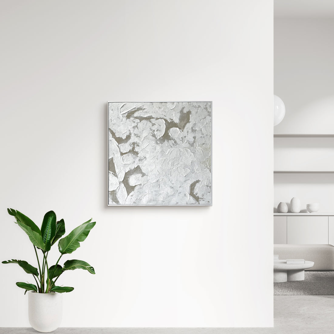 Luma Framed Textured Abstract Canvas displayed in a contemporary living space, demonstrating how its artful design and neutral palette enhance various interior styles.