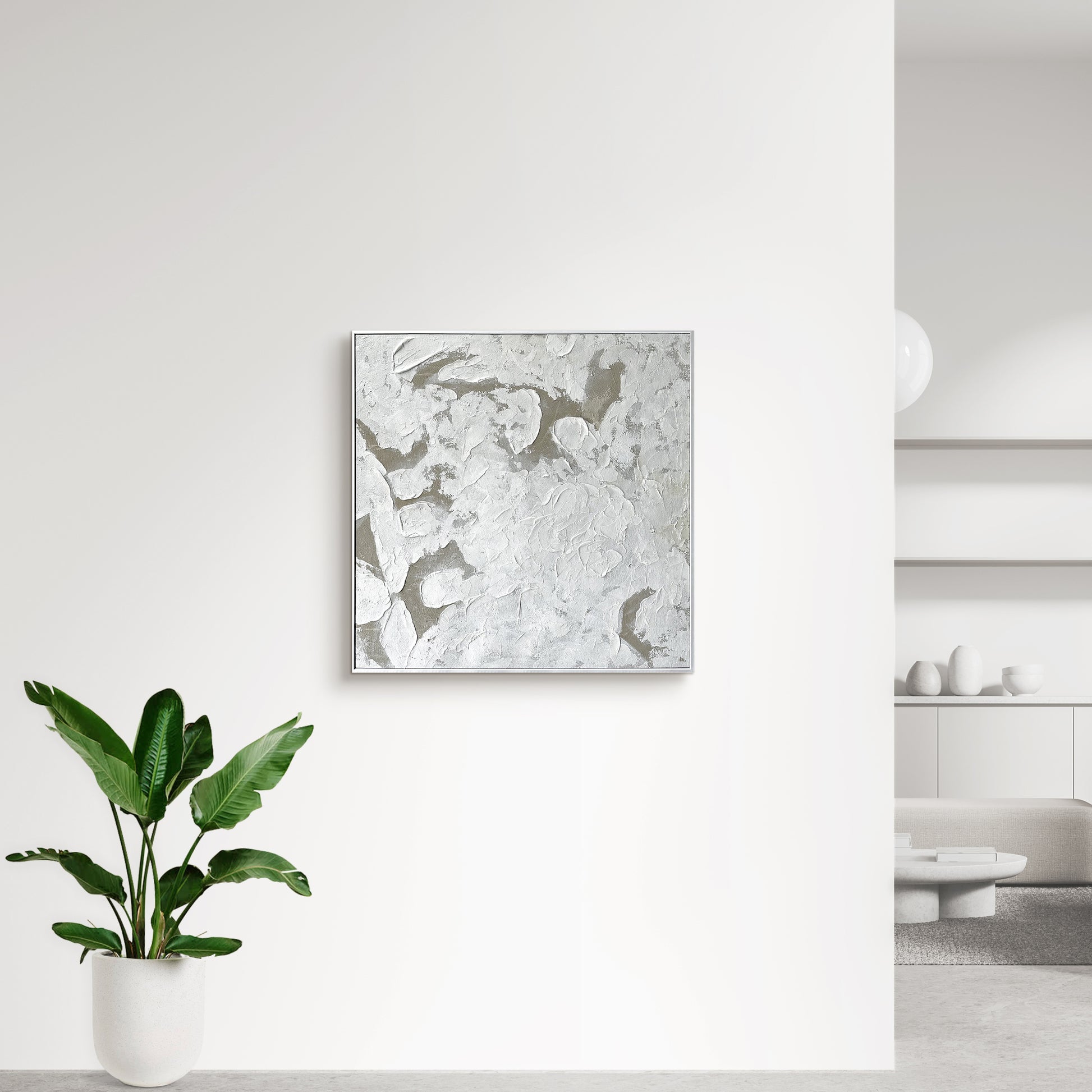 Luma Framed Textured Abstract Canvas displayed in a contemporary living space, demonstrating how its artful design and neutral palette enhance various interior styles.