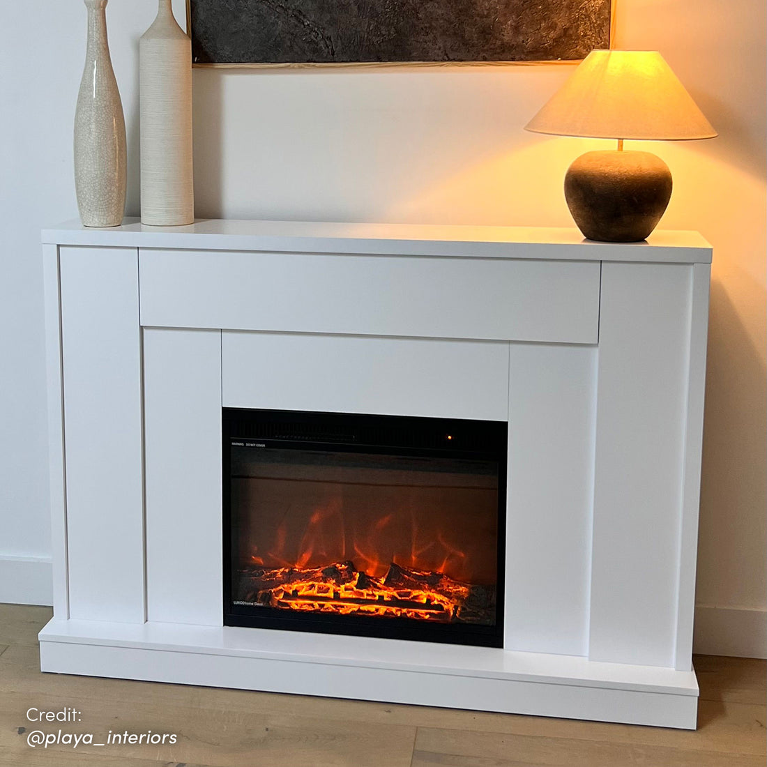 Stylish interior design with Armidale 132cm 1600W Electric Fireplace with White mantle as a focal point, complementing classic or contemporary decor