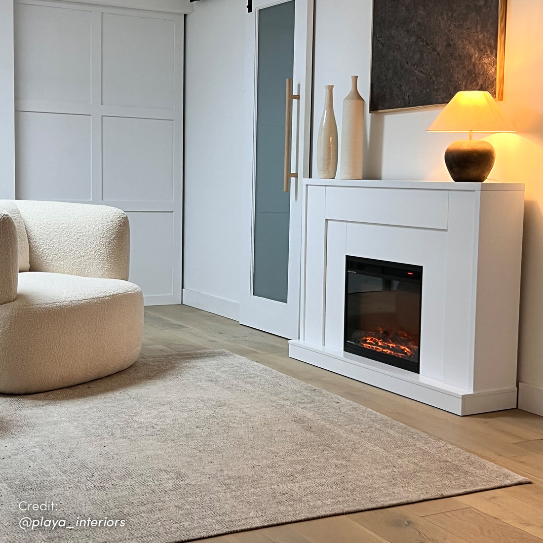 Stylish interior design with Armidale 132cm 1600W Electric Fireplace with White mantle as a focal point, complementing classic or contemporary decor