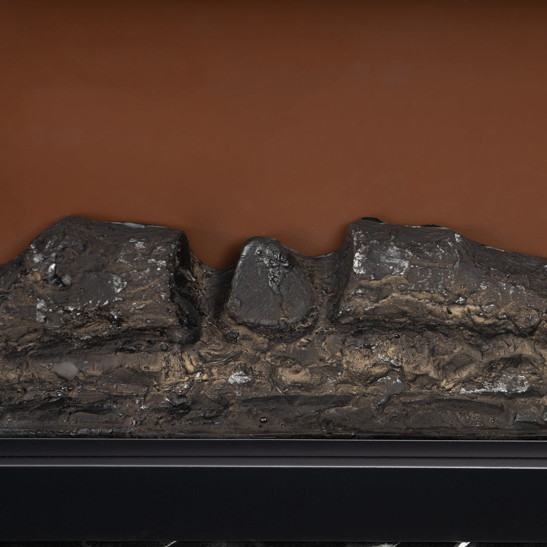 Close-up decorative logs of Awaba Electric Fireplace 1950W with LED Flame and Timer - Black Marble
