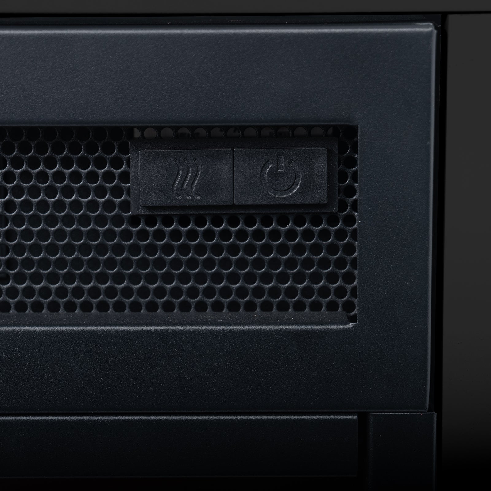 Close-up of the Bago 129cm 1950W LED Electric Fireplace with Mantel Black, showing a perforated metal grille and two buttons for heat and power control, emphasizing its sleek, modern design.