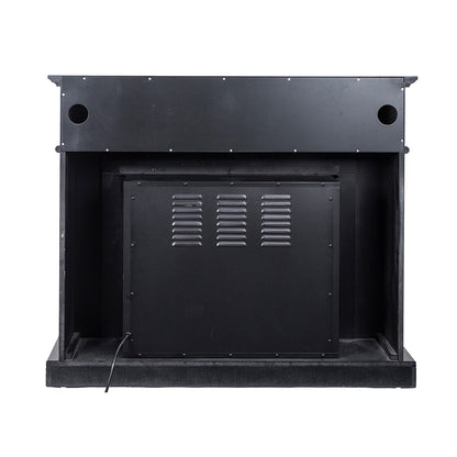 Rear view of Banhi 1500W Electric Fireplace Heater with Mantel in Black, showing matte black housing, circular vent cut-outs, vented metal panel, and emerging power cord for efficient warmth.