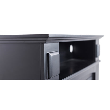 Close-up of the Banhi 1500W Electric Fireplace Heater with Mantel in Black, showing a matte-black media console corner, open cubby with cable hole, and sliding-door pull, highlighting its sleek, modern design.