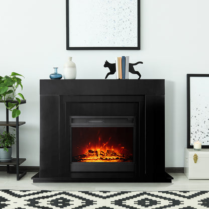 Oprah 1950W Free Standing Electric Mantel Fireplace in Black, featuring a sleek design with a minimalist mantel, decorative vases, books, and a bold geometric rug enhancing the cozy ambiance.