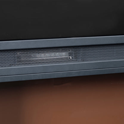 Close-up of Oprah 1950W Free Standing Electric Mantel Fireplace in Black, showing black bezel and perforated metal grille, likely part of the speaker or vent, on a wooden surface.