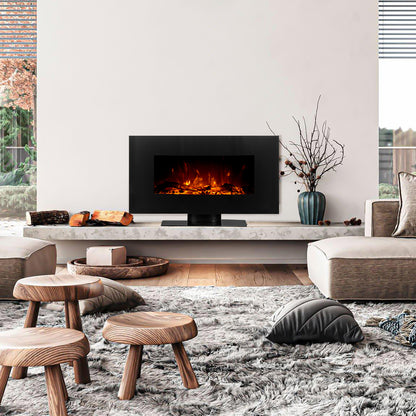 Wyoming 90cm Free Standing LED Electric Fireplace in Black, featuring glowing flames, sleek curved design on a floating stone shelf, with logs and a sculptural vase nearby, enhancing modern living room ambience.