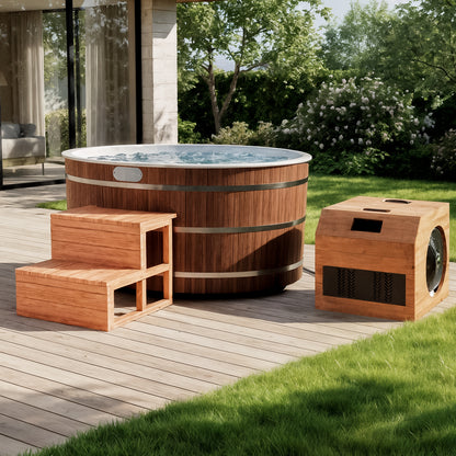 Denman 2 Person Outdoor Ice Bath with 1.5HP Chiller in Natural on a wooden deck, featuring a wood-clad hot tub, two-step stool, and wood-encased pump/heater unit amidst a garden setting.