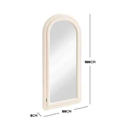 Auden 180cm Arch Full Length Mirror in Beige features a softly rounded top and cream-colored, textured bouclé frame, offering a full head-to-toe view for a stylish, space-enhancing effect.