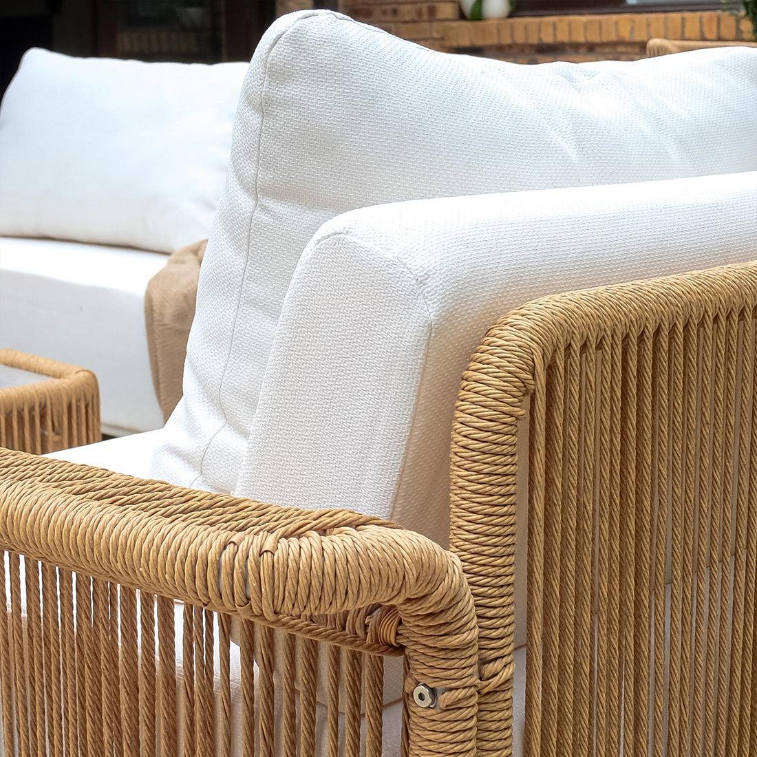 Close-up of the Avon 5-Seater Premium Aluminium Rattan Outdoor Lounge Set featuring wicker detailing and plush cushions, showcasing the luxurious and durable design ideal for outdoor settings.