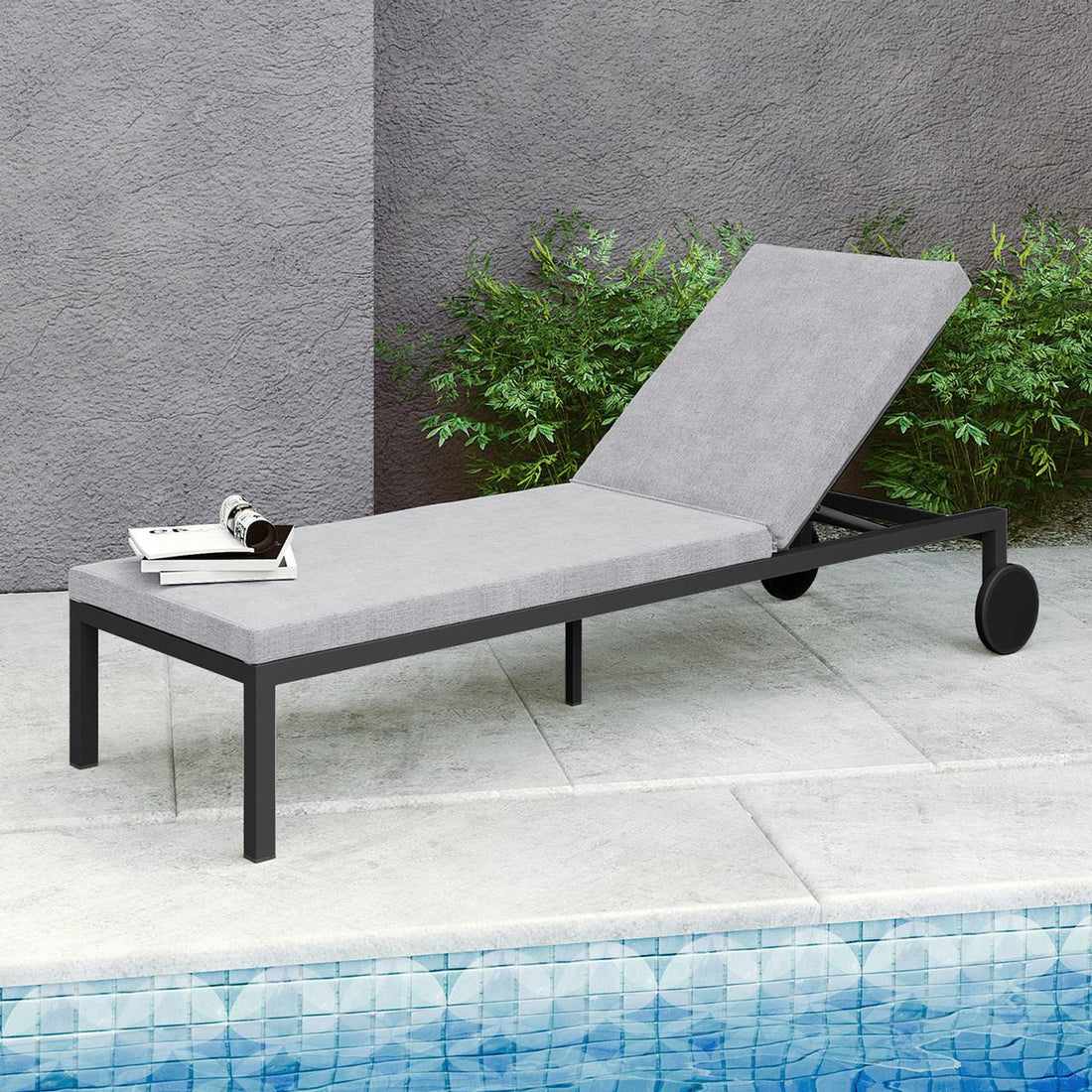 Bahiya Aluminium Outdoor Sunbed with Cushion Dark Grey, showcasing its sleek design, sturdy aluminium frame, thick cushion, and built-in wheels, ideal for enhancing any outdoor space.