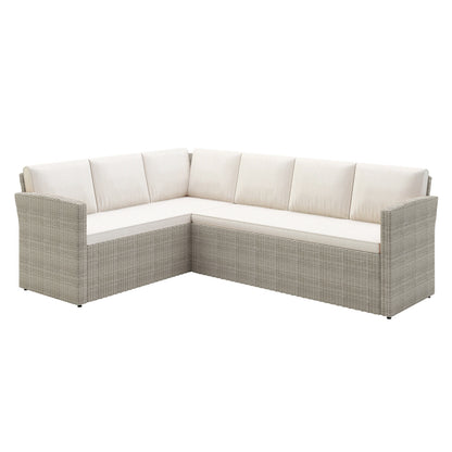 Close-up of Ballena 6 Seater Wicker Outdoor Dining Sofa Set featuring a woven wicker texture, padded cushions, and a sleek dining table with a clear glass top, perfect for outdoor gatherings.