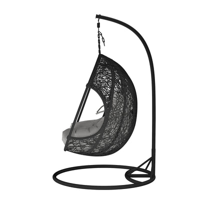 Basin Two-Seater Hanging Egg Chair with Cushion, featuring a woven egg-shaped seat suspended by a chain from a curved metal support, includes a plush padded cushion for comfort.