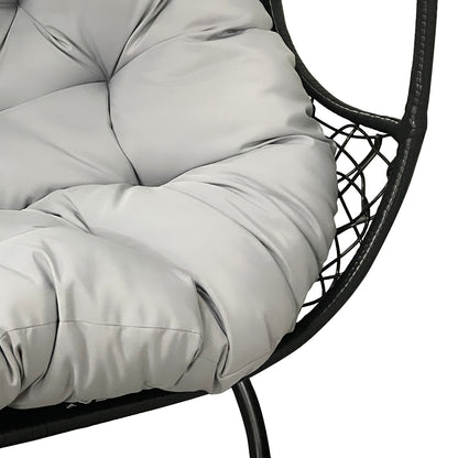 Close-up of Basin Two-Seater Hanging Egg Chair with Cushion in Black, highlighting the plush, tufted grey seat cushion within the circular black metal frame, emphasizing its comfort and modern design.