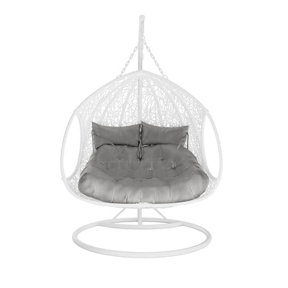 Basin 2-Seater Hanging Egg Chair with Cushion in White features a woven frame and a matching metal stand, fitted with a large tufted cushion, ideal for indoor or outdoor relaxation.