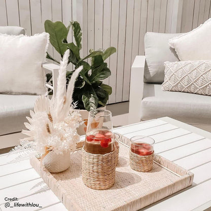 Luxo Bayo 6 Seater Aluminium Outdoor Furniture Set featuring a white pillow on a shelf, emphasizing the comfort and style with 15cm thick cushions, ideal for garden gatherings.