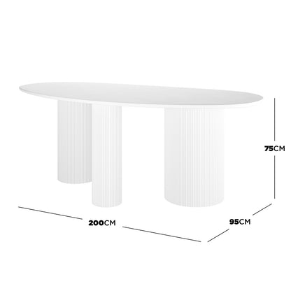 Belmar 200cm Curved Outdoor Concrete Dining Table in White, featuring an oval top with three fluted cylindrical pedestals, ideal for indoor and outdoor gatherings, comfortably seating up to eight people.