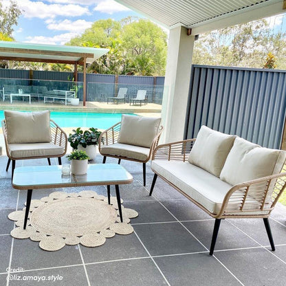 Bequia 4 Seater Rope Wicker Outdoor Sofa Light Beige, showcasing its wicker texture, plush cushions, and Scandinavian legs, emphasizing its elegant design suitable for outdoor lounging.