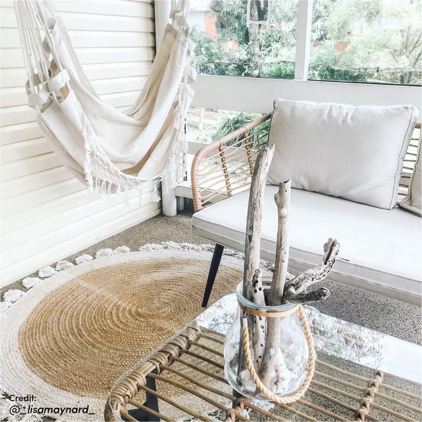 Bequia 4 Seater Rope Wicker Outdoor Sofa Light Beige features a sleek rope-wicker design with cushioned seating, ideal for outdoor lounging. Visually, the sofa incorporates Scandinavian-inspired legs and a clear glass table surface.