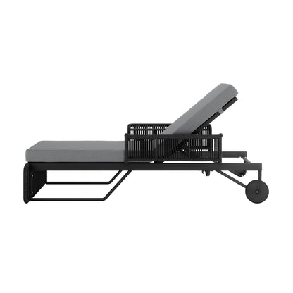 Boonoo Premium Aluminium Outdoor Rattan Sun Lounger Grey displayed in a relaxed outdoor setting, showcasing its adjustable reclining positions and handwoven rattan design, emphasizing comfort with plush, quick-dry cushions.