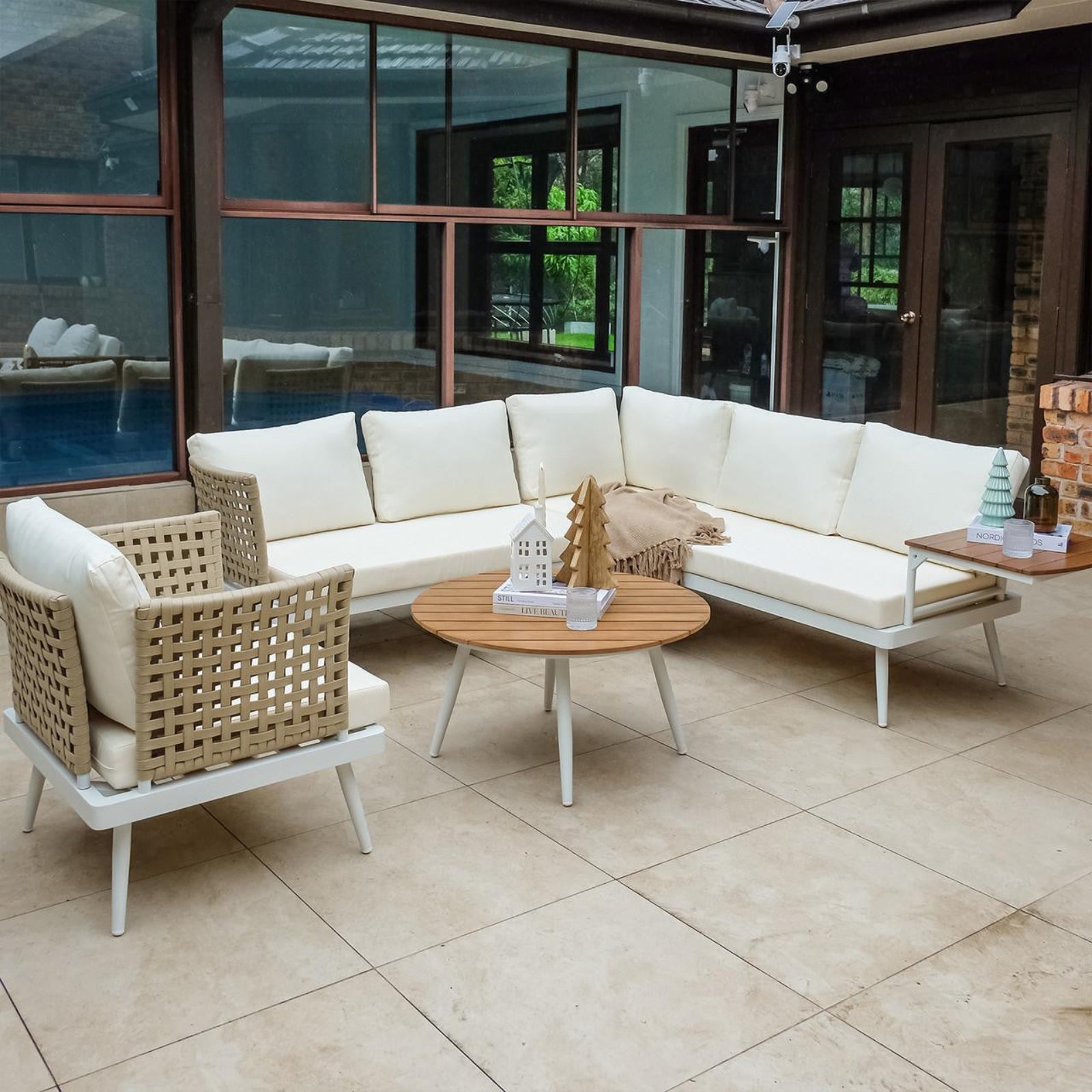 Breeza 5-Seater Outdoor Corner Lounge Set with Teak Table features a cream white cushioned couch, teak table, and durable design ideal for relaxing or hosting in open-air spaces.