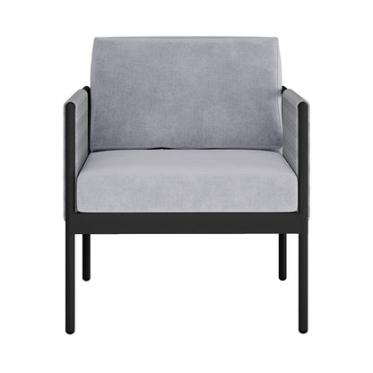 Brujas 4 Seater Wicker Outdoor Lounge Set in Grey features a modern, minimalist armchair with a sleek black metal frame and light grey upholstery, offering a contemporary aesthetic for outdoor relaxation.