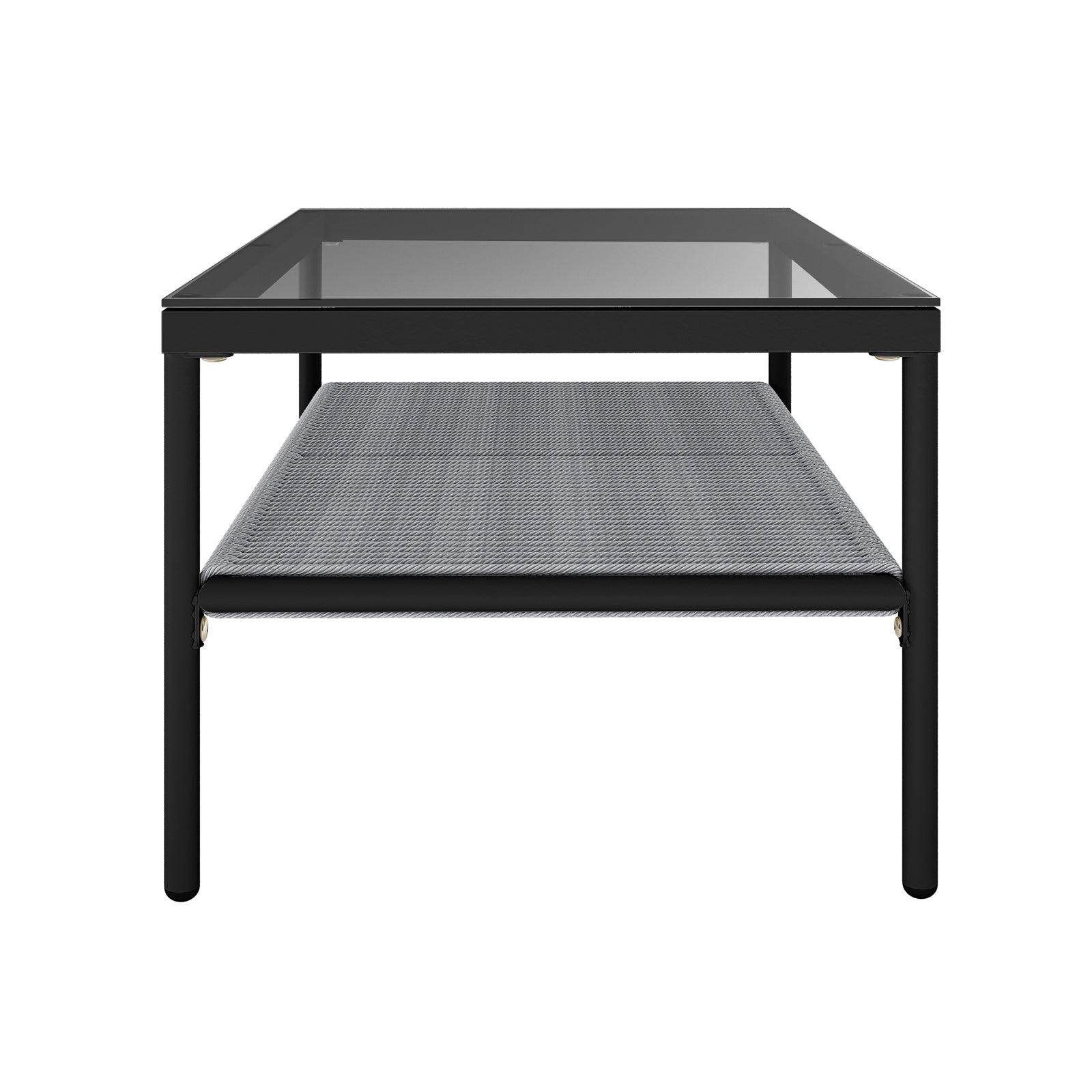 Brujas 4 Seater Wicker Outdoor Lounge Set in Grey features a low, rectangular coffee table with a black metal frame, clear glass tabletop, and gray woven shelf, supported by tubular metal legs.