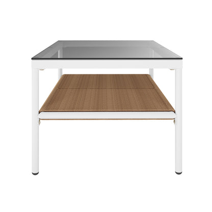 The Brujas 4 Seater Wicker Outdoor Lounge Set in Light Beige features a minimalist coffee table with a white metal frame, clear glass top, and woven rope shelf, perfect for covered outdoor spaces.