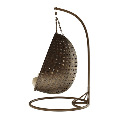 Buena 2 Person Wicker Outdoor Hanging Egg Chair in Brown, featuring a perforated egg-shaped design with plush light-colored cushions, suspended from a curved metal frame, perfect for outdoor relaxation.