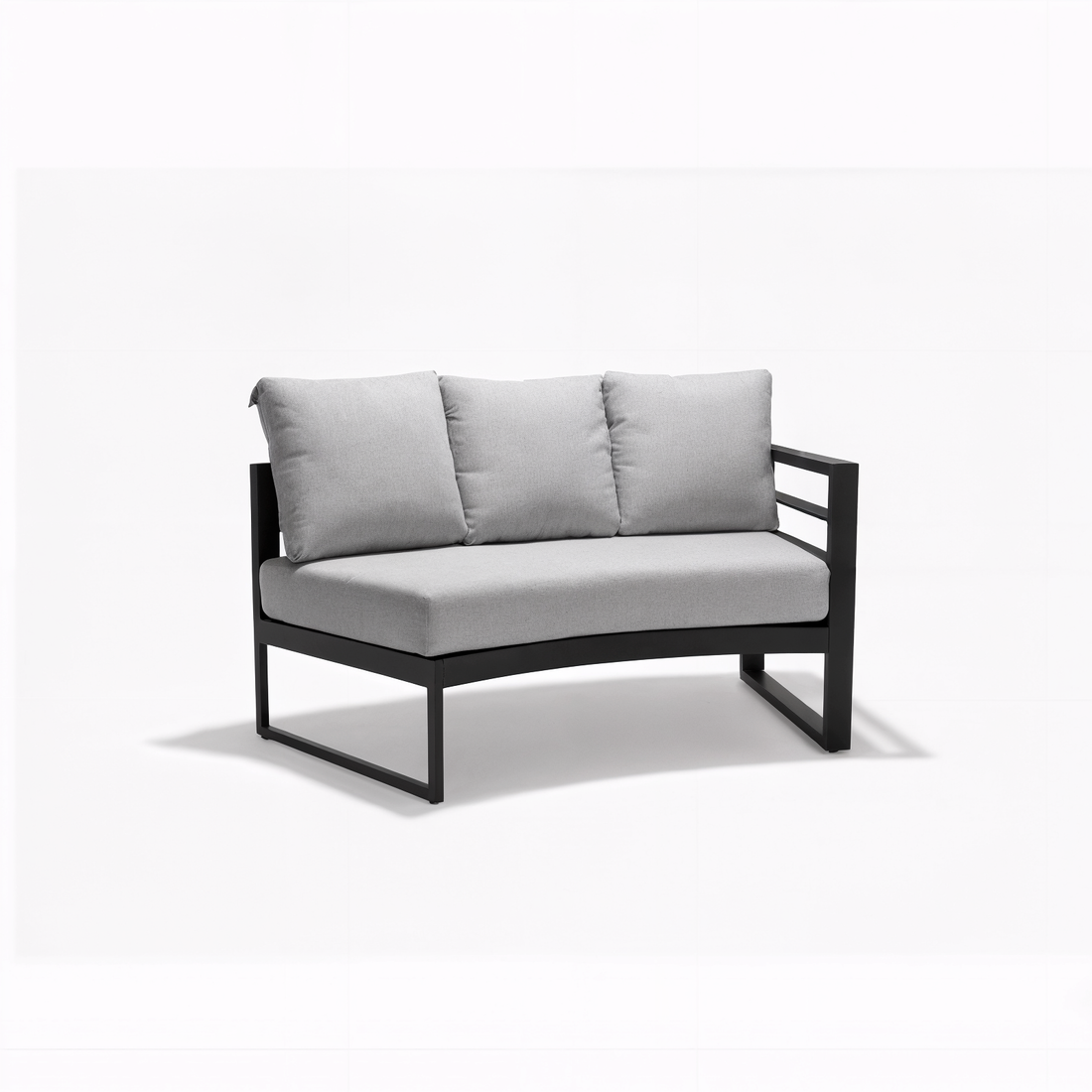 Callanna 5 Seater Curved Outdoor Lounge Set in Dark Grey, featuring a low-profile, black metal-framed corner lounge seat with a thick gray seat cushion and three matching back cushions.