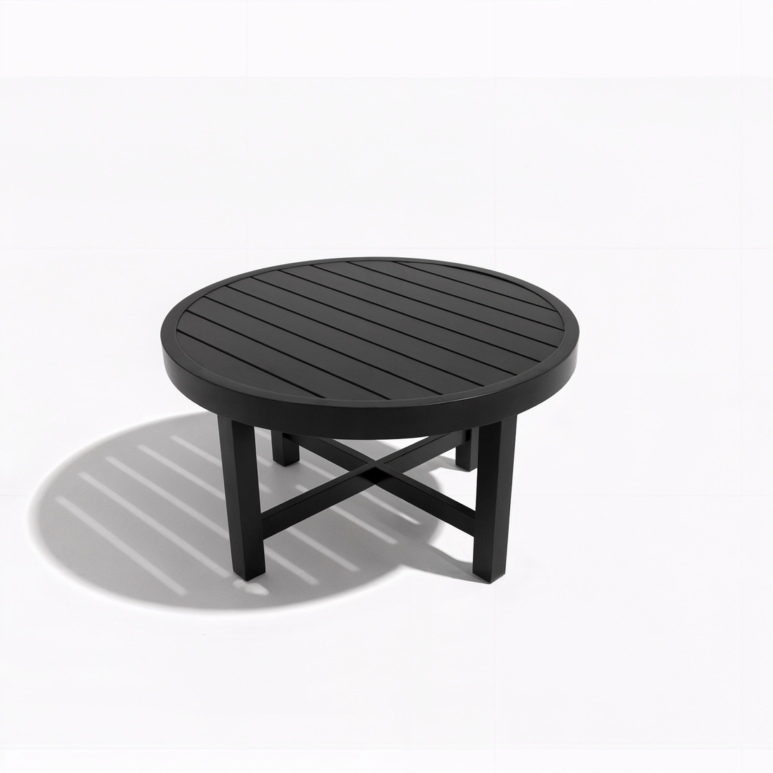 Callanna 5 Seater Curved Outdoor Lounge Set in Dark Grey with round coffee table featuring a slatted top, four legs with cross-bracing, displayed on a plain white background casting a soft shadow.